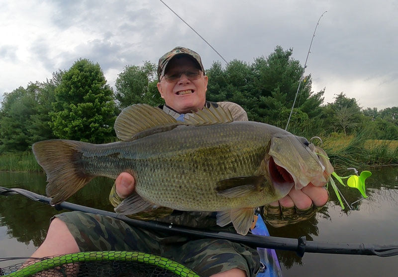 jim with a big bass caught on a buzzbait