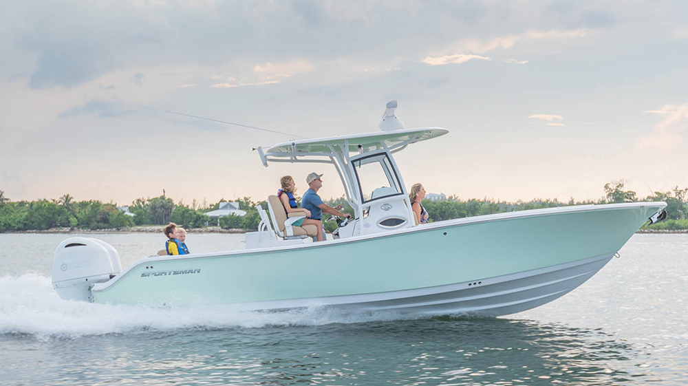 family on a center console boat