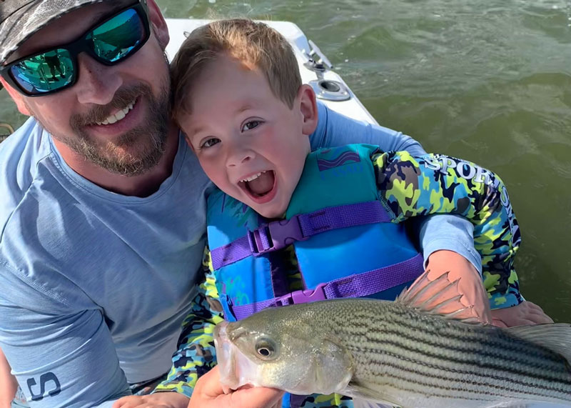 dad fishing with his son