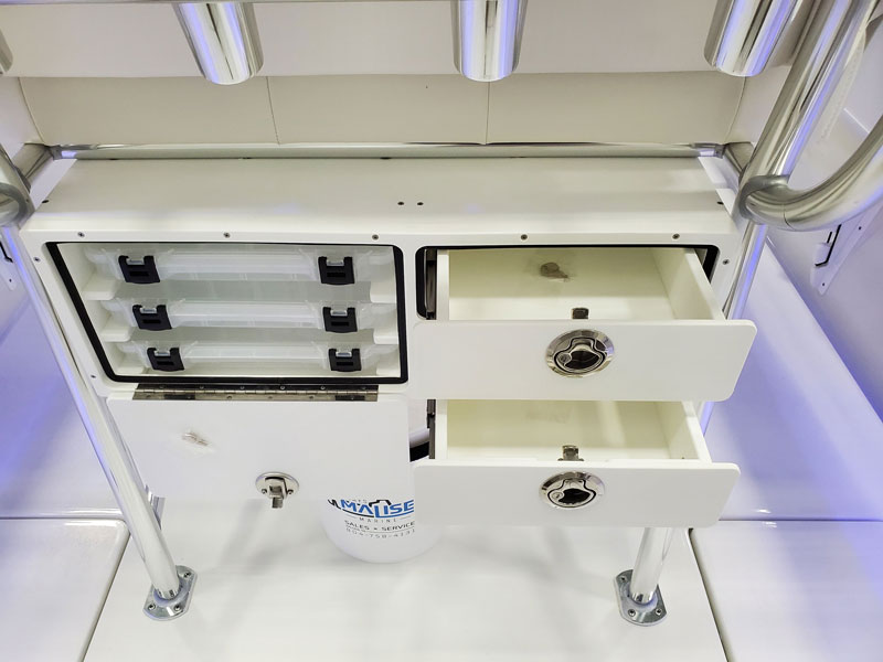 tackle station in a pair customs 28 fishing boat