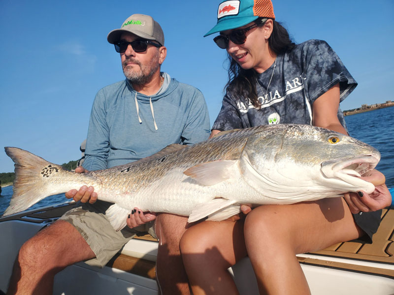 anglers with a new PB redfish