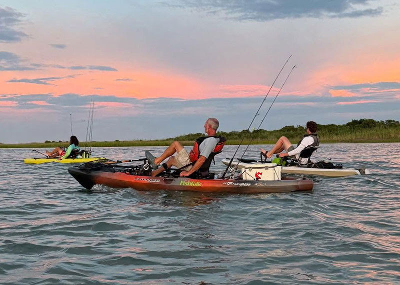 pedaling a kayak to go fishing