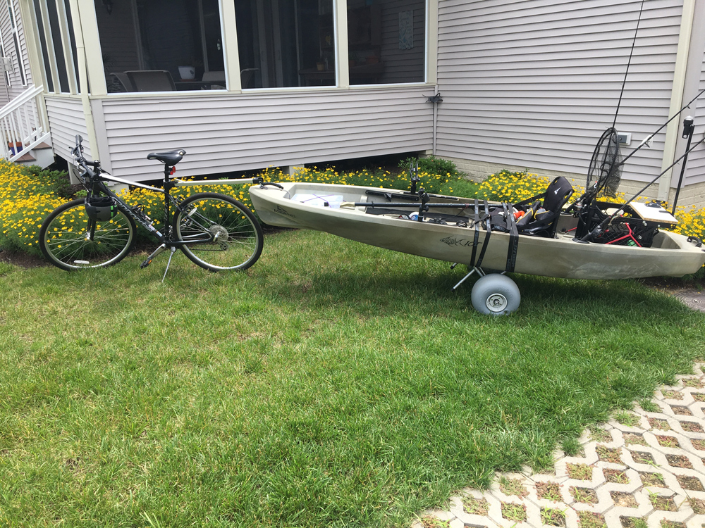 towing a kayak behind a bicycle